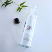 Bouteille en verre carrée transparente de 750 ml avec couvercle pour liqueur, vin, whisky, vodka, tequila et huile d'olive