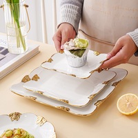 Assiettes de service et assiettes de présentation en porcelaine à bord doré avec papillon doré scintillant pour hôtel, maison, sans BPA