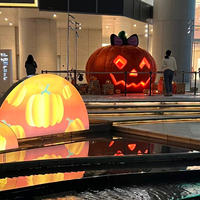 Citrouille gonflable lumineuse en peluche avec nœud pour la décoration commerciale, la publicité et les grands événements de la fête d'Halloween