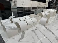 Dalle brillante en marbre de porcelaine Carrelage en pierre frittée Calacatta Dalle de pierre frittée blanche