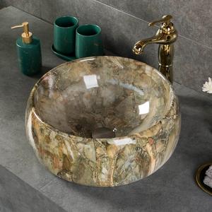 Lavabo <span class=keywords><strong>de</strong></span> mármol redondo sobre encimera <span class=keywords><strong>de</strong></span> diseño moderno Fregadero <span class=keywords><strong>de</strong></span> recipiente <span class=keywords><strong>de</strong></span> lavado único para inodoro <span class=keywords><strong>de</strong></span> baño Nuevo DISEÑO <span class=keywords><strong>DE</strong></span> Canton Fair - Product Image 1