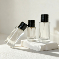 Flacons de parfum cylindriques de 30 ml et 50 ml, très demandés, en verre de luxe personnalisé avec diffuseur à bâtonnets et capuchon pulvérisateur transparent