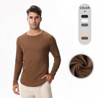 T-shirt de sport respirant et écologique à manches longues pour homme, coupe classique, en coton et élasthanne, séchage rapide, idéal pour l'entraînement et comme sous-vêtement technique.