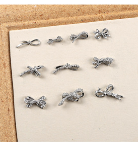 50 pièces de breloques pour ongles en alliage, motifs nœud papillon français et cravate 3D, ornements métalliques pour la décoration de manucure - Product Image 3