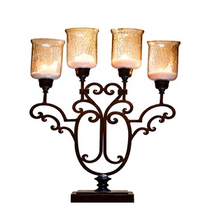 Candélabre en fer à 4 lumières avec pots à bougies en verre ambré et décorations en fer forgé pour la décoration intérieure - Product Image 1
