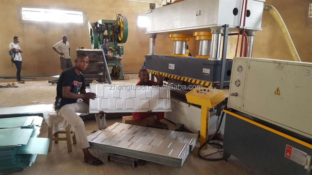 Color steel stone coated roofing tile making machine metal tile machine in China