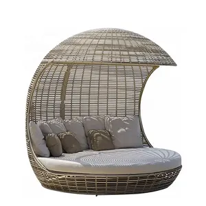 Veranda hasır Rattan koltuk mobilya yaratıcı yuvarlak yatak kuş yuvası Recliner balkon güneş şezlong PE Rattan Daybed