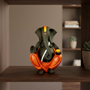Statue moderne en résine du dieu Ganesha assis |   Finition Noir Orange |   Idole décorative artisanale pour le bureau à domicile |   Cadeau spirituel |   Nirmala - Product Image 1