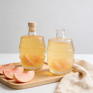 Vente d'usine : Bouteilles de spiritueux en verre de 500 ml, forme baril, avec <span class=keywords><strong>bouchon</strong></span> en liège, <span class=keywords><strong>pour</strong></span> <span class=keywords><strong>vin</strong></span> de fruits, tequila, vodka, whisky, gin – Luxe et raffinement - Product Image 1