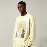 T-shirt à manches longues col rond Butter Wash, imprimé graphique rétro soleil, bords effilochés, coupe oversize, style streetwear