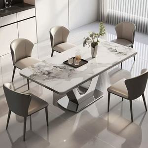 โต๊ะอาหารทรงสี่เหลี่ยมผืนผ้าสไตล์โมเดิร์นมินิมอล พร้อมท็อปหิน ดีไซน์เรียบหรู เหมาะสำหรับครอบครัวขนาดเล็ก รวมเก้าอี้ - Product Image 3