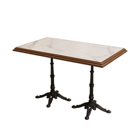 Table de salle à manger rectangulaire moderne en pierre frittée avec pieds en fonte pour restaurants, hôtels, bistrots et cafés - Vente en gros OEM pour commandes en vrac