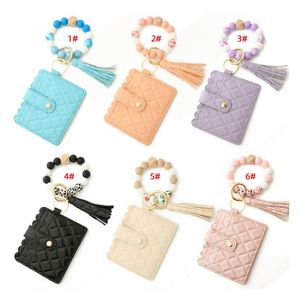 Wholesale <b>Men</b> Women Elastic Silicone <b>Bead</b> Bangle <b>Bracelet</b> Wallet Keychain Leather Tassel Wristlet Keychain Wallet - Product Image 2