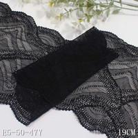 Lots de liquidation en gros Prix usine Tissu dentelle extensible 22 cm Maille élastique Nylon Spandex Bordure dentelle florale noir et blanc