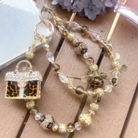 Chaîne de téléphone portable en perles léopard et strass, décoration de sac, porte-clés de luxe DIY personnalisable, vente en gros