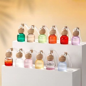 Pendentif <span class=keywords><strong>parfum</strong></span>é pour voiture 10 ml coloré - Flacon diffuseur d'aromathérapie pour voiture - Forme ronde - Product Image 1