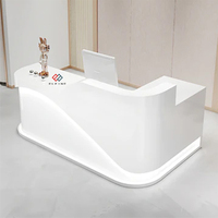 Centre de remise en forme au design unique pour hôtel, comptoir de réception moderne en surface solide blanche