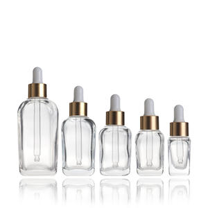 Flacons de sérum élégants en verre transparent rechargeables de luxe avec compte-gouttes doré brillant pour huile de soin de la peau 10ml 20ml 30ml 50ml 100ml - Product Image 1
