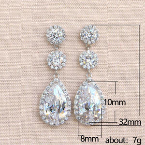 E1038 Orecchini pendenti in cristallo oro bianco per donna, stile classico da matrimonio, con montatura a castone - Product Image 5