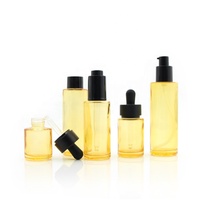 Flacon compte-gouttes en verre transparent à épaule plate orange de 20 à 100 ml avec bouchon noir pour huile essentielle, soin de la peau, pot