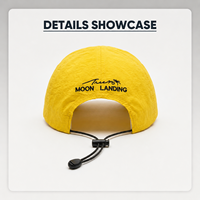 Casquettes à cordon réglable en gros de l'usine OEM en Chine - Casquettes streetwear à séchage rapide à 5 panneaux avec broderie personnalisée 'Moon Landing'