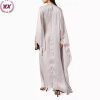 Baju Muslim Wanita Arab Model Cape Kerah Tinggi dengan Hiasan Manik-Manik dan Potongan Bawah Melengkung Desain Terbaru