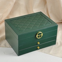 Boîte de rangement à bijoux en cuir PU de luxe moderne rectangulaire à trois tiroirs avec logo personnalisé et serrure à clé