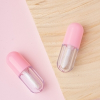Nouveau Design 2ml Emballage Tube En Plastique Capsule Liquide En Forme De Pilule Unique Brillant À Lèvres Tube Marque Privée Huile À Lèvres Rouge À Lèvres Tube