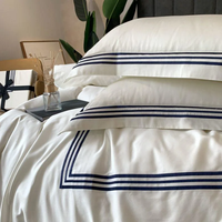 Ensemble de linge de lit de luxe pour hôtel 5 étoiles personnalisé 300TC 60s drap de lit King Size brodé en satin de coton à longues fibres pour usage domestique