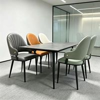 Chaise de salle à manger italienne haut de gamme, design nordique moderne, en cuir léger de luxe, dossier confortable pour la maison, l'hôtel, les négociations, en métal