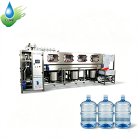 Chaîne de production complète et entièrement automatique de lavage, remplissage et mise en bouteille d'eau potable de type linéaire, pour bouteilles de 19L, 20L et 5 gallons (A à Z)