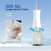 Hydropulseur dentaire portable électrique pour soins bucco-dentaires