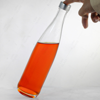 Échantillon gratuit 750 ml Boissons gazeuses haut de gamme Eau minérale française evian Bouteille en verre pour l'utilisation des boissons