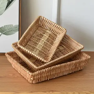 Customized wholesale woven natural rattan handmade storage basket with handles