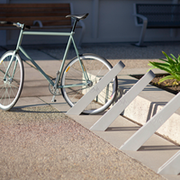 Support de vélo incliné moderne en métal robuste pour stationnement au sol, idéal pour les rues, les parcs et les écoles