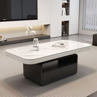 Table basse minimaliste et écologique avec plateau en pierre frittée, structure en bois, emballage plat et montage facile pour appartement