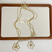 Collier pendentif fleur rétro en métal, style luxueux, longue chaîne florale pour clavicule, accessoire en alliage, chaîne de pull pour femme