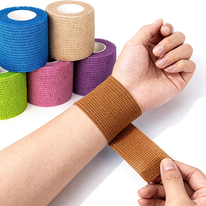 ضمادة طبية ذاتية اللصق مخصصة من Xingda، ضمادة متماسكة غير منسوجة للإسعافات الأولية لتثبيت الجروح بشكل آمن - Product Image 1