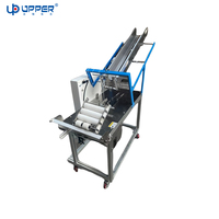 Machine de pagination à aspiration pour sachets de masques faciaux et patchs