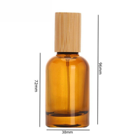 Haute qualité Transparent ovale ambre 100ml luxe air parfum vaporisateur bouteille bambou couverture vaporisateur voyage verre ensemble avec boîte