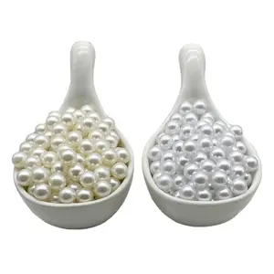 white plastic beads 14 mm diameter These white plastic beads are also great  for filling vases.