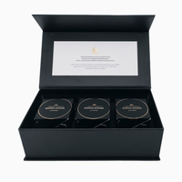 Boîtes cadeaux rigides en carton noir pour cosmétiques et parfums, avec logo personnalisé, couvercle à rabat magnétique et insert en mousse.