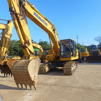 Excavatrice sur chenilles hydraulique Komatsu PC200-11M1 d'occasion, 20 tonnes, avec godet Cummins de 0,94 m et puissance de 108 kW, pour travaux de construction, d'exploitation minière et de terrassement.