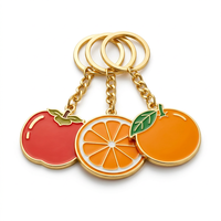 Sleutelhanger van emaille en zinklegering in fruitvorm, op maat gemaakt ontwerp in perzikoranje voor leuke promotionele geschenken & souvenirs