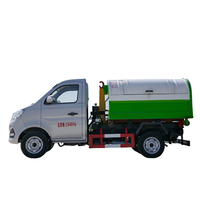 Camion à ordures élévateur à crochet compact Changan 4 CBM bras hydraulique système de décollage collecteur d'ordures automatique 4x2 manuel Euro 4 émissions