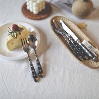 Ensemble de couverts modernes en acier inoxydable 18/0 avec manche en bakélite poli miroir pour la maison, les fêtes et les restaurants