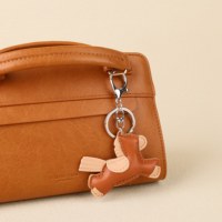 Breloque de sac en cuir PU en forme de cheval unique, accessoire décoratif tendance pour sacs à main, sacs à dos et bagages