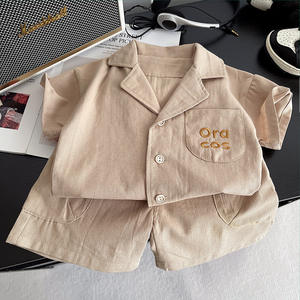 Ensemble décontracté deux pièces pour garçons, nouveau pour l'été, veste à revers à manches courtes confortable et <span class=keywords><strong>short</strong></span> pour vêtements pour enfants - Product Image 3