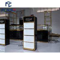 Vitrine de Comptoir de Luxe en Acier Inoxydable et Verre avec Éclairage LED pour Parfums – Écologique, Étanche, Personnalisable, Recyclable et Durable