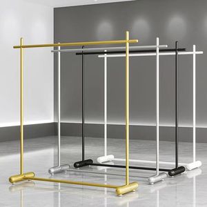 Perchero moderno de metal dorado, estante colgador de suelo a suelo para ropa de mujer, estante de exhibición colgante lateral - Product Image 6